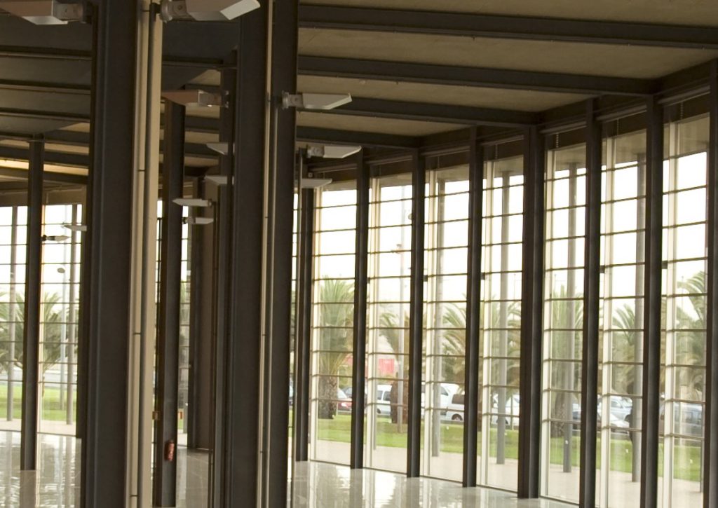 Glazed lobby facade with trees outside