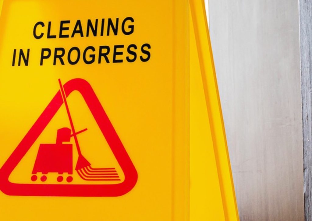 Yellow cleaning-in-progress floor sign