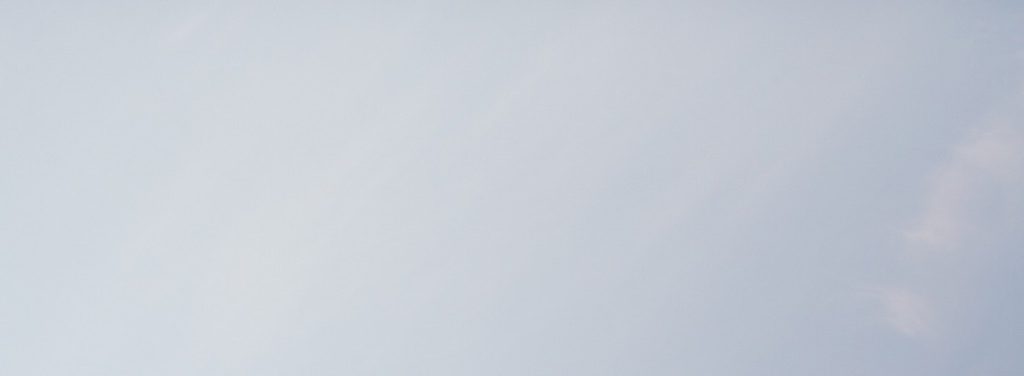 Pale sky above a building