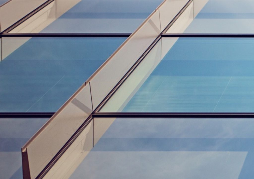 Glazed facade panels and sky